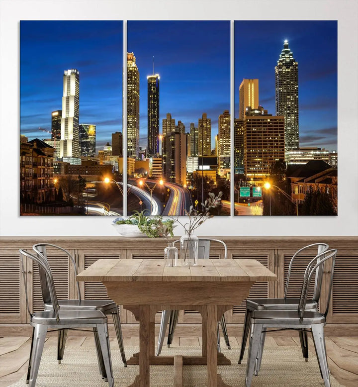 A modern living room is enhanced by the "Atlanta Cityscape View Wall Art Canvas Print" displayed as a triptych on museum-quality canvas. The hand-assembled framed art adds sophistication, crafting an inviting atmosphere. Complete your stylish space effortlessly with free shipping.