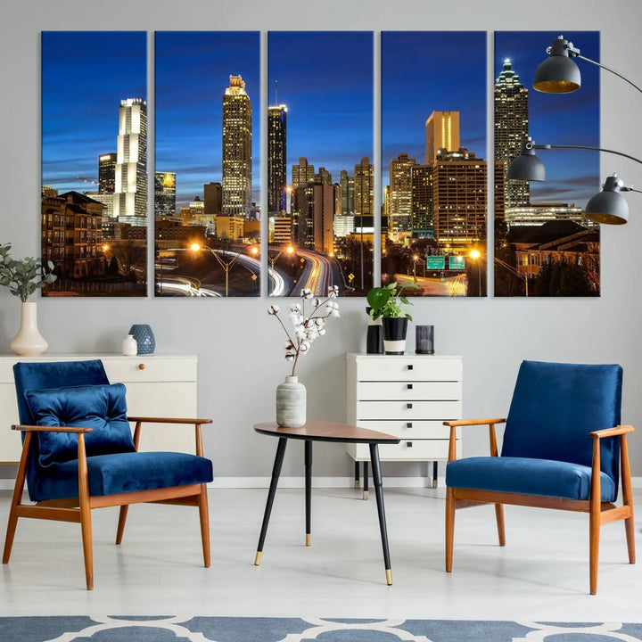 A modern living room is enhanced by the "Atlanta Cityscape View Wall Art Canvas Print" displayed as a triptych on museum-quality canvas. The hand-assembled framed art adds sophistication, crafting an inviting atmosphere. Complete your stylish space effortlessly with free shipping.