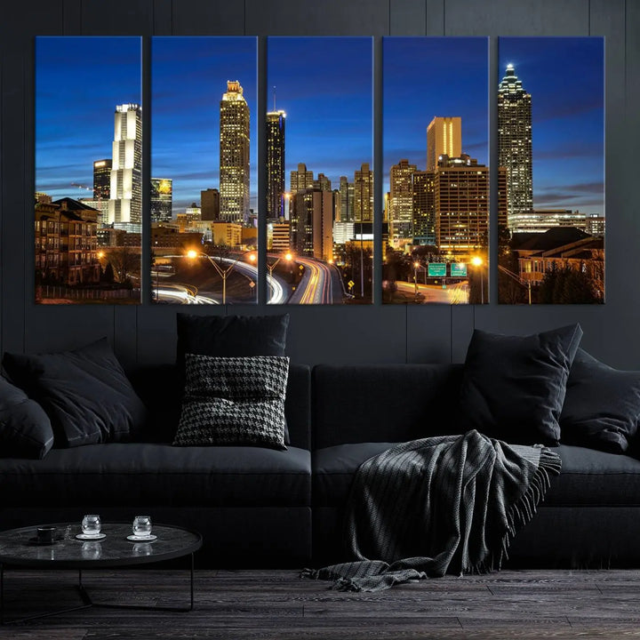 A modern living room is enhanced by the "Atlanta Cityscape View Wall Art Canvas Print" displayed as a triptych on museum-quality canvas. The hand-assembled framed art adds sophistication, crafting an inviting atmosphere. Complete your stylish space effortlessly with free shipping.