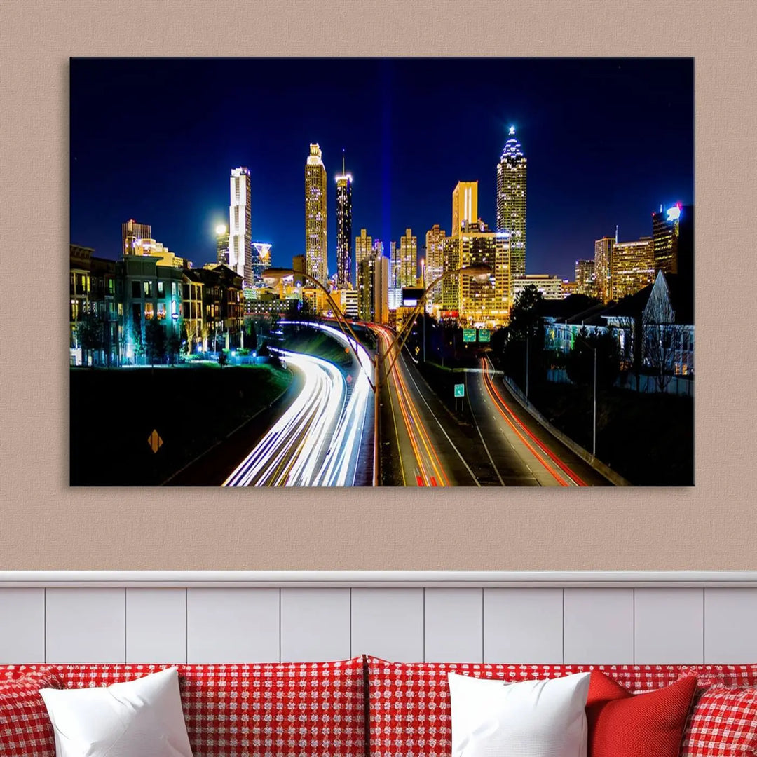 The "Atlanta Highways City View Wall Art Canvas Print" features a stunning triptych of a city skyline at night, crafted with museum-quality canvas. It comes ready to hang for an effortless addition to your decor.