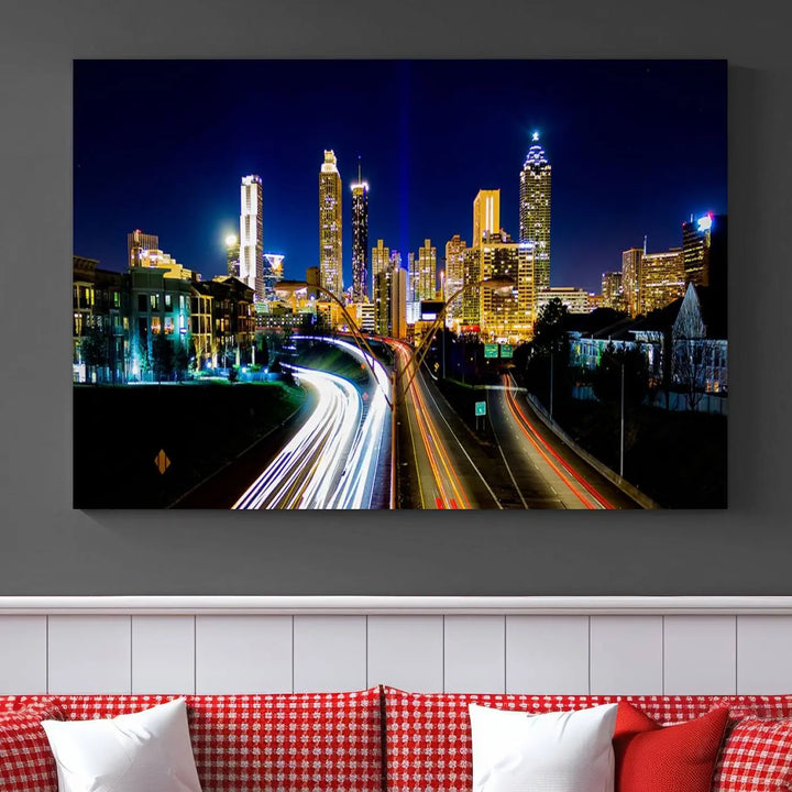 The "Atlanta Highways City View Wall Art Canvas Print" features a stunning triptych of a city skyline at night, crafted with museum-quality canvas. It comes ready to hang for an effortless addition to your decor.