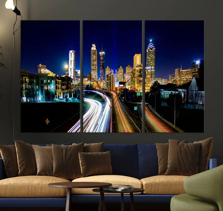 The "Atlanta Highways City View Wall Art Canvas Print" features a stunning triptych of a city skyline at night, crafted with museum-quality canvas. It comes ready to hang for an effortless addition to your decor.