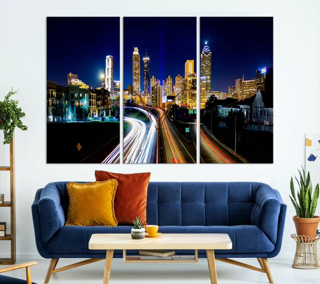 The "Atlanta Highways City View Wall Art Canvas Print" features a stunning triptych of a city skyline at night, crafted with museum-quality canvas. It comes ready to hang for an effortless addition to your decor.