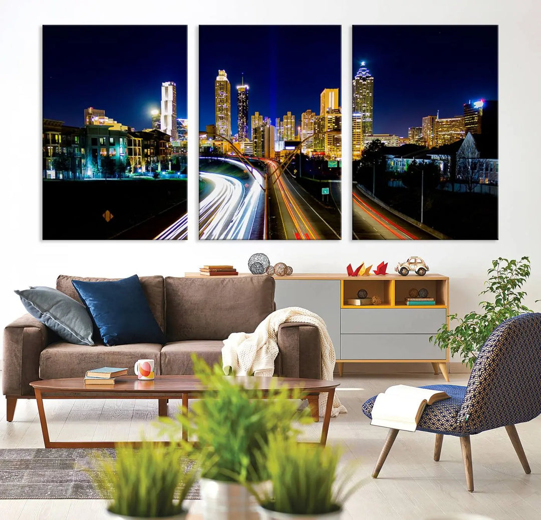 The "Atlanta Highways City View Wall Art Canvas Print" features a stunning triptych of a city skyline at night, crafted with museum-quality canvas. It comes ready to hang for an effortless addition to your decor.