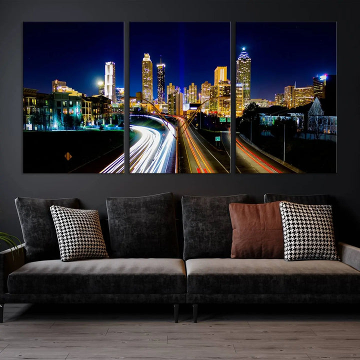 The "Atlanta Highways City View Wall Art Canvas Print" features a stunning triptych of a city skyline at night, crafted with museum-quality canvas. It comes ready to hang for an effortless addition to your decor.