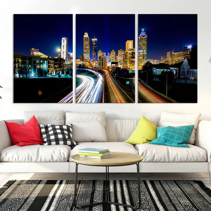 The "Atlanta Highways City View Wall Art Canvas Print" features a stunning triptych of a city skyline at night, crafted with museum-quality canvas. It comes ready to hang for an effortless addition to your decor.