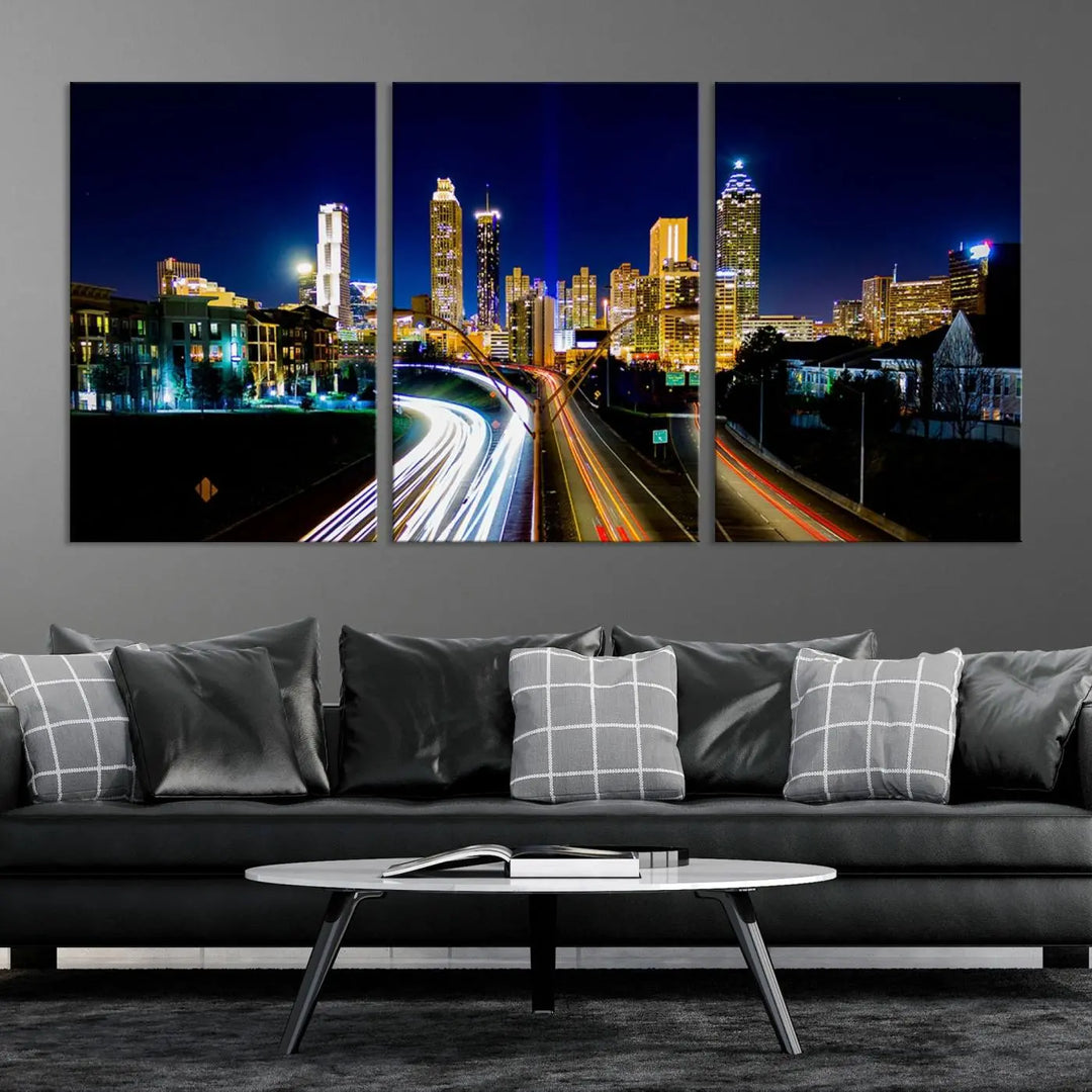 The "Atlanta Highways City View Wall Art Canvas Print" features a stunning triptych of a city skyline at night, crafted with museum-quality canvas. It comes ready to hang for an effortless addition to your decor.