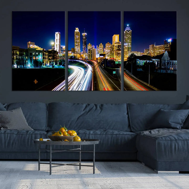 The "Atlanta Highways City View Wall Art Canvas Print" features a stunning triptych of a city skyline at night, crafted with museum-quality canvas. It comes ready to hang for an effortless addition to your decor.