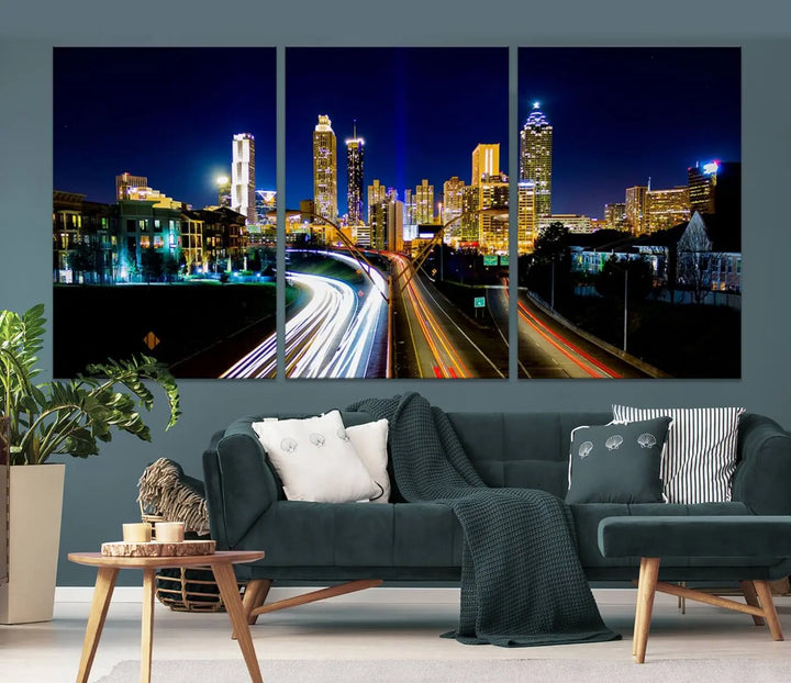 The "Atlanta Highways City View Wall Art Canvas Print" features a stunning triptych of a city skyline at night, crafted with museum-quality canvas. It comes ready to hang for an effortless addition to your decor.