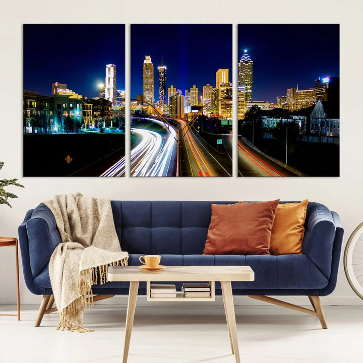 The "Atlanta Highways City View Wall Art Canvas Print" features a stunning triptych of a city skyline at night, crafted with museum-quality canvas. It comes ready to hang for an effortless addition to your decor.