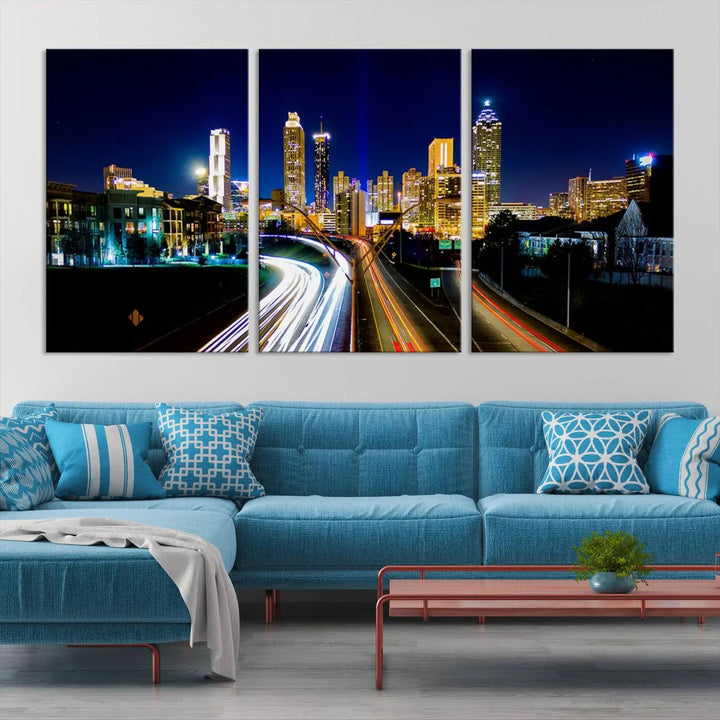 The "Atlanta Highways City View Wall Art Canvas Print" features a stunning triptych of a city skyline at night, crafted with museum-quality canvas. It comes ready to hang for an effortless addition to your decor.