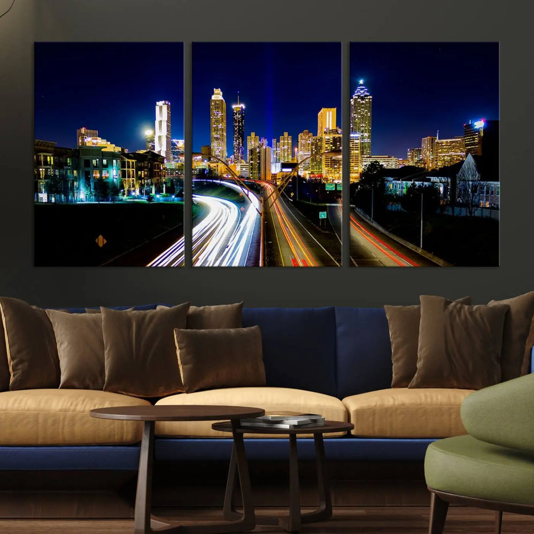 The "Atlanta Highways City View Wall Art Canvas Print" features a stunning triptych of a city skyline at night, crafted with museum-quality canvas. It comes ready to hang for an effortless addition to your decor.