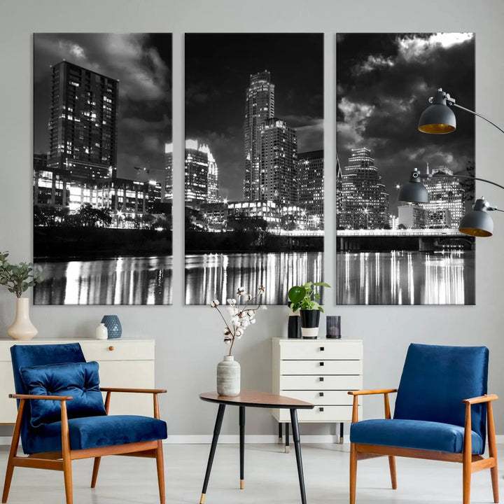 The Austin City Lights Cloudy Skyline Black and White Wall Art Cityscape Canvas Print is a large triptych that showcases illuminated city buildings reflected in water at night. This artwork is produced on museum-quality canvases with a UV-protective coating, ensuring its vibrancy and longevity for years to come.