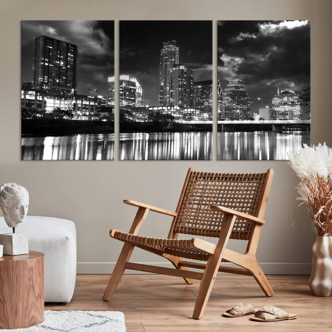 The Austin City Lights Cloudy Skyline Black and White Wall Art Cityscape Canvas Print is a large triptych that showcases illuminated city buildings reflected in water at night. This artwork is produced on museum-quality canvases with a UV-protective coating, ensuring its vibrancy and longevity for years to come.