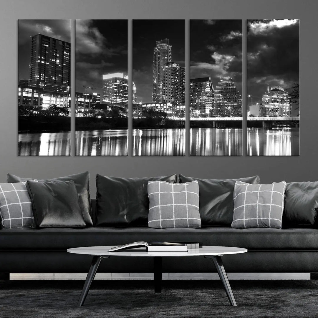 The Austin City Lights Cloudy Skyline Black and White Wall Art Cityscape Canvas Print is a large triptych that showcases illuminated city buildings reflected in water at night. This artwork is produced on museum-quality canvases with a UV-protective coating, ensuring its vibrancy and longevity for years to come.