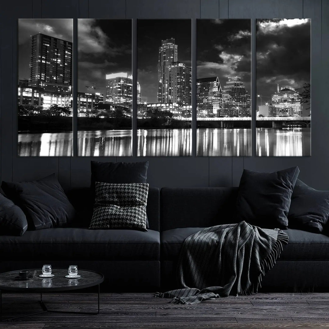 The Austin City Lights Cloudy Skyline Black and White Wall Art Cityscape Canvas Print is a large triptych that showcases illuminated city buildings reflected in water at night. This artwork is produced on museum-quality canvases with a UV-protective coating, ensuring its vibrancy and longevity for years to come.