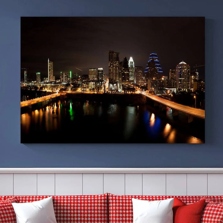 The Austin City Lights Night Skyline Cityscape View Wall Art Canvas Print adorns the wall. Each gallery-wrapped piece is printed on museum-quality canvas and features a UV-protective coating to maintain its vibrant allure.