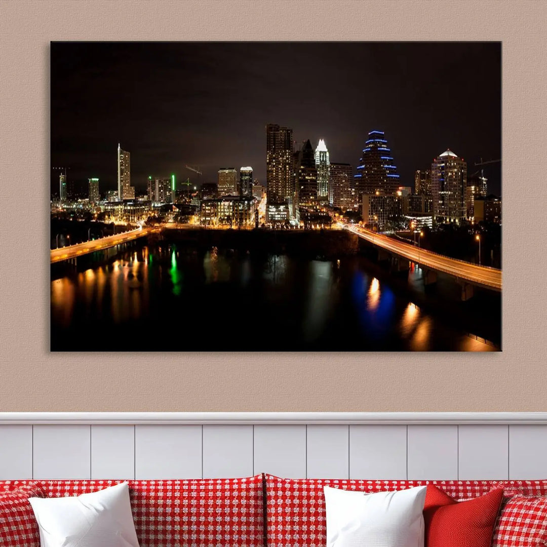 The Austin City Lights Night Skyline Cityscape View Wall Art Canvas Print adorns the wall. Each gallery-wrapped piece is printed on museum-quality canvas and features a UV-protective coating to maintain its vibrant allure.