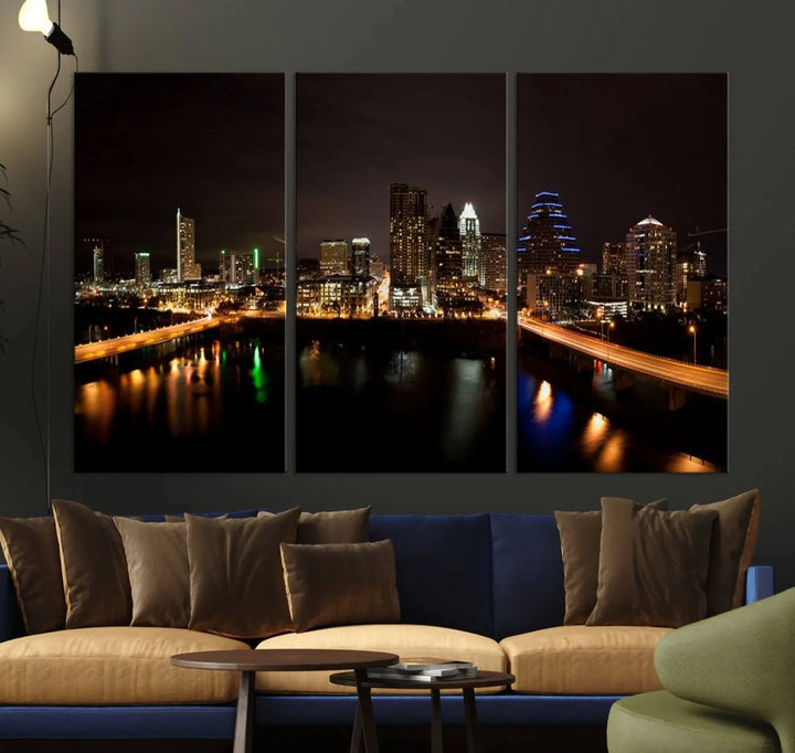 The Austin City Lights Night Skyline Cityscape View Wall Art Canvas Print adorns the wall. Each gallery-wrapped piece is printed on museum-quality canvas and features a UV-protective coating to maintain its vibrant allure.