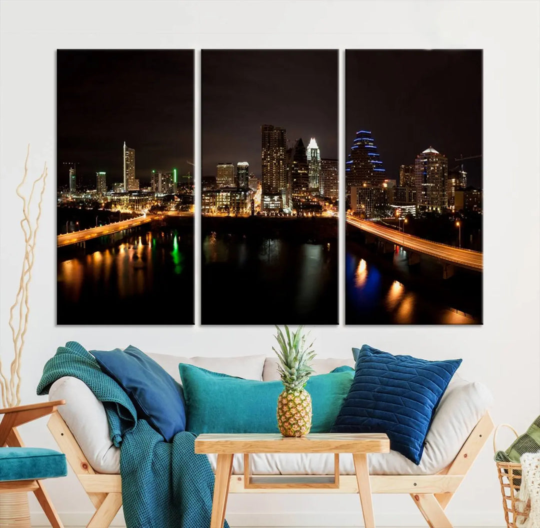 The Austin City Lights Night Skyline Cityscape View Wall Art Canvas Print adorns the wall. Each gallery-wrapped piece is printed on museum-quality canvas and features a UV-protective coating to maintain its vibrant allure.