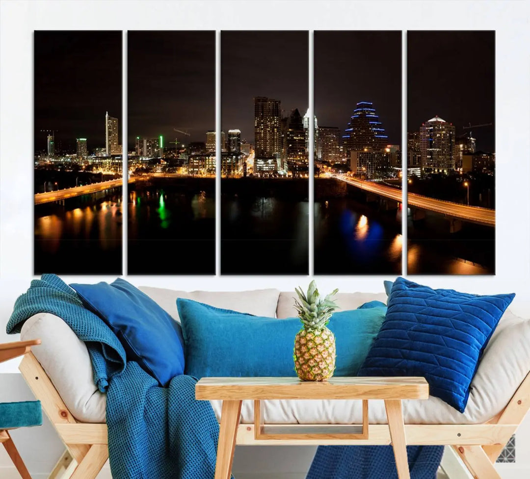 The Austin City Lights Night Skyline Cityscape View Wall Art Canvas Print adorns the wall. Each gallery-wrapped piece is printed on museum-quality canvas and features a UV-protective coating to maintain its vibrant allure.