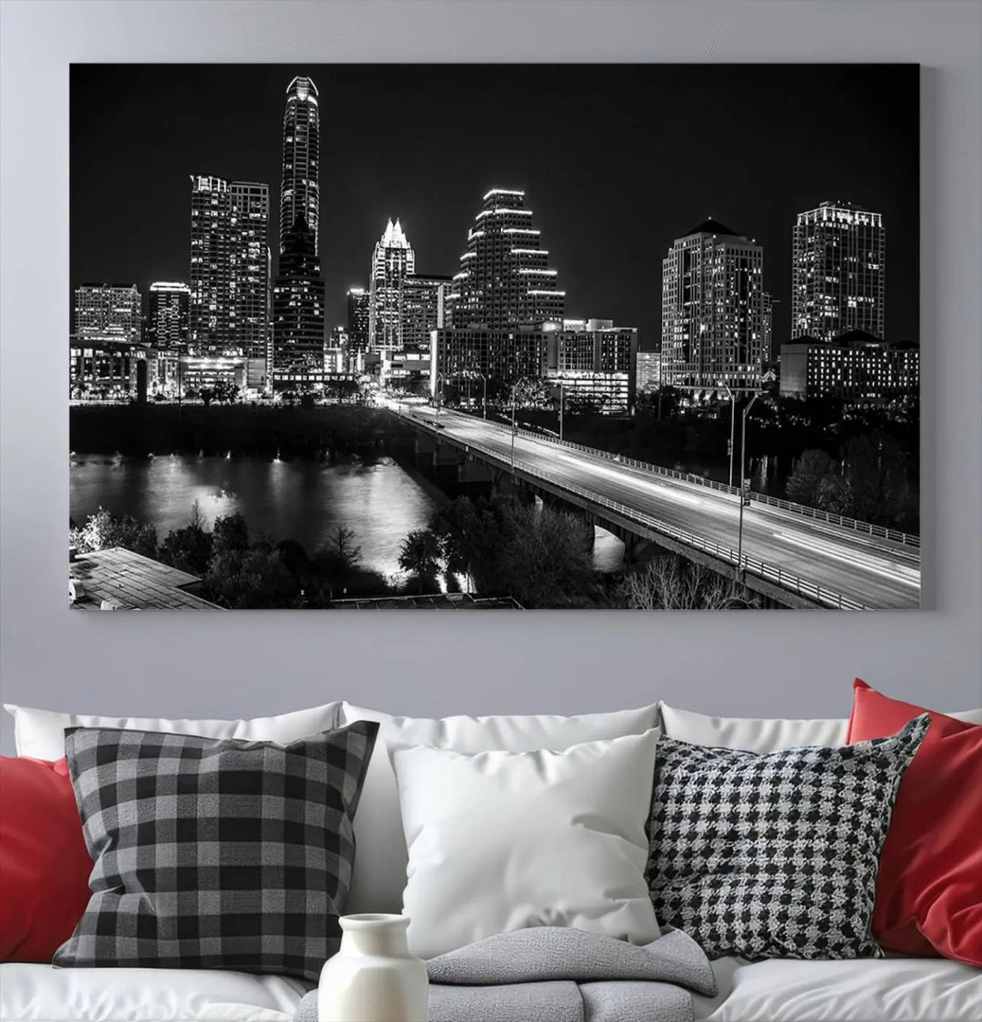 A modern living room highlights the "Austin City Lights Skyline Black and White Wall Art Canvas Print" above the sofa. These museum-quality canvases feature a UV-protective coating to preserve their brilliance.