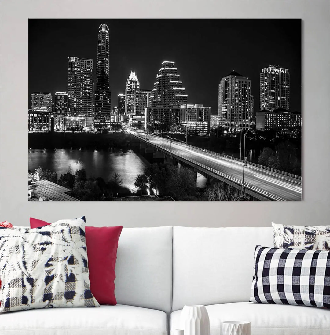 A modern living room highlights the "Austin City Lights Skyline Black and White Wall Art Canvas Print" above the sofa. These museum-quality canvases feature a UV-protective coating to preserve their brilliance.