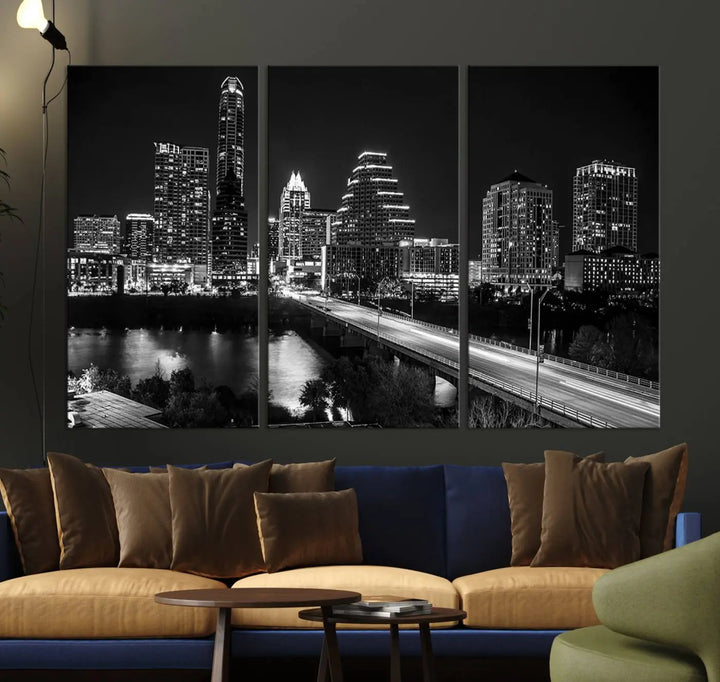 A modern living room highlights the "Austin City Lights Skyline Black and White Wall Art Canvas Print" above the sofa. These museum-quality canvases feature a UV-protective coating to preserve their brilliance.