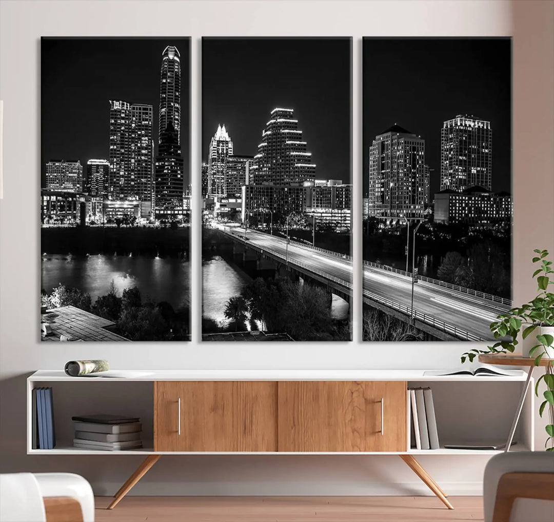 A modern living room highlights the "Austin City Lights Skyline Black and White Wall Art Canvas Print" above the sofa. These museum-quality canvases feature a UV-protective coating to preserve their brilliance.