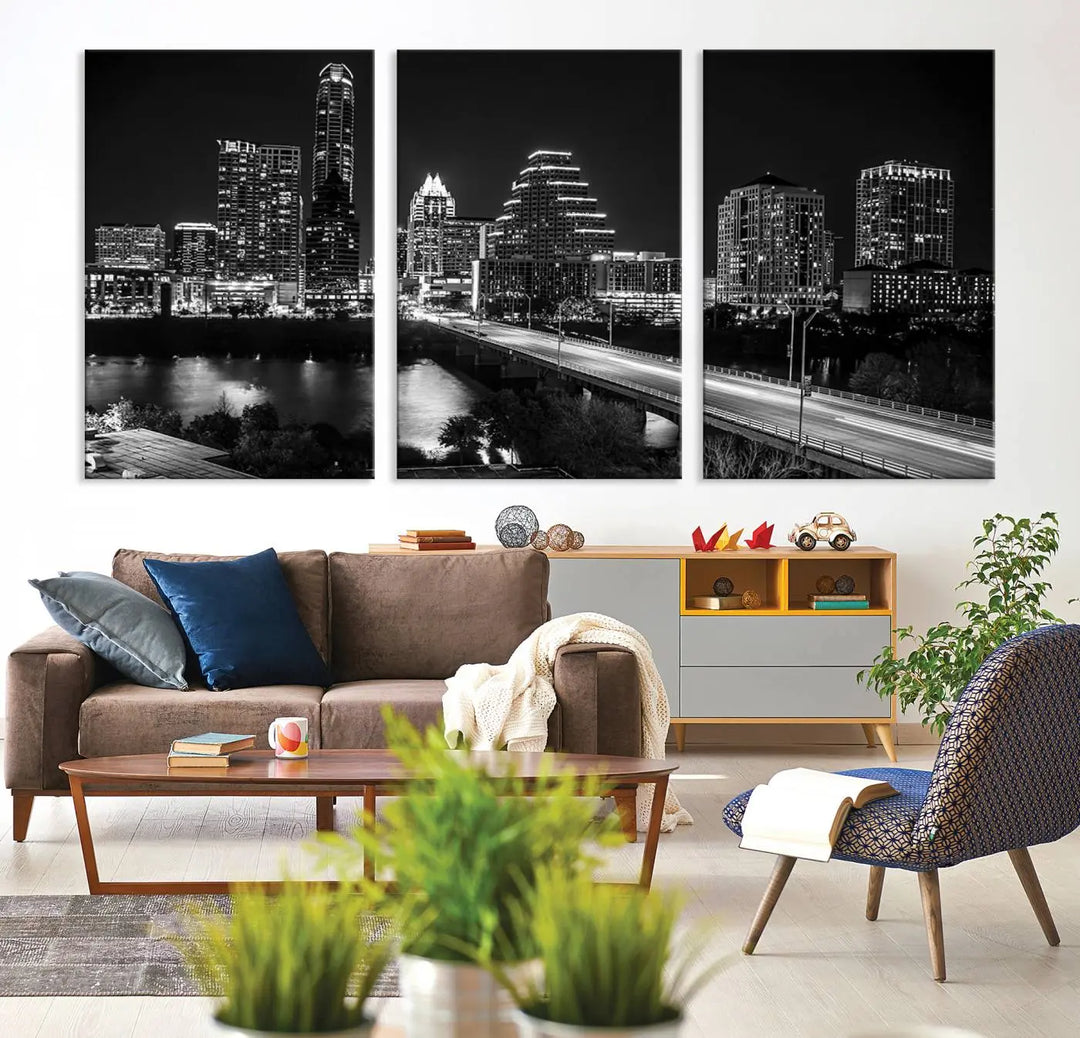 A modern living room highlights the "Austin City Lights Skyline Black and White Wall Art Canvas Print" above the sofa. These museum-quality canvases feature a UV-protective coating to preserve their brilliance.