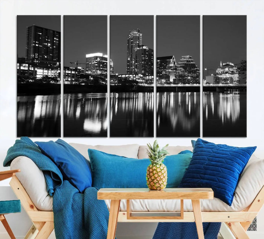 The Austin City Lights Skyline Black and White Wall Art Cityscape Canvas Print, a gallery-wrapped, museum-quality piece, adorns the wall, adding an elegant touch to the living space.