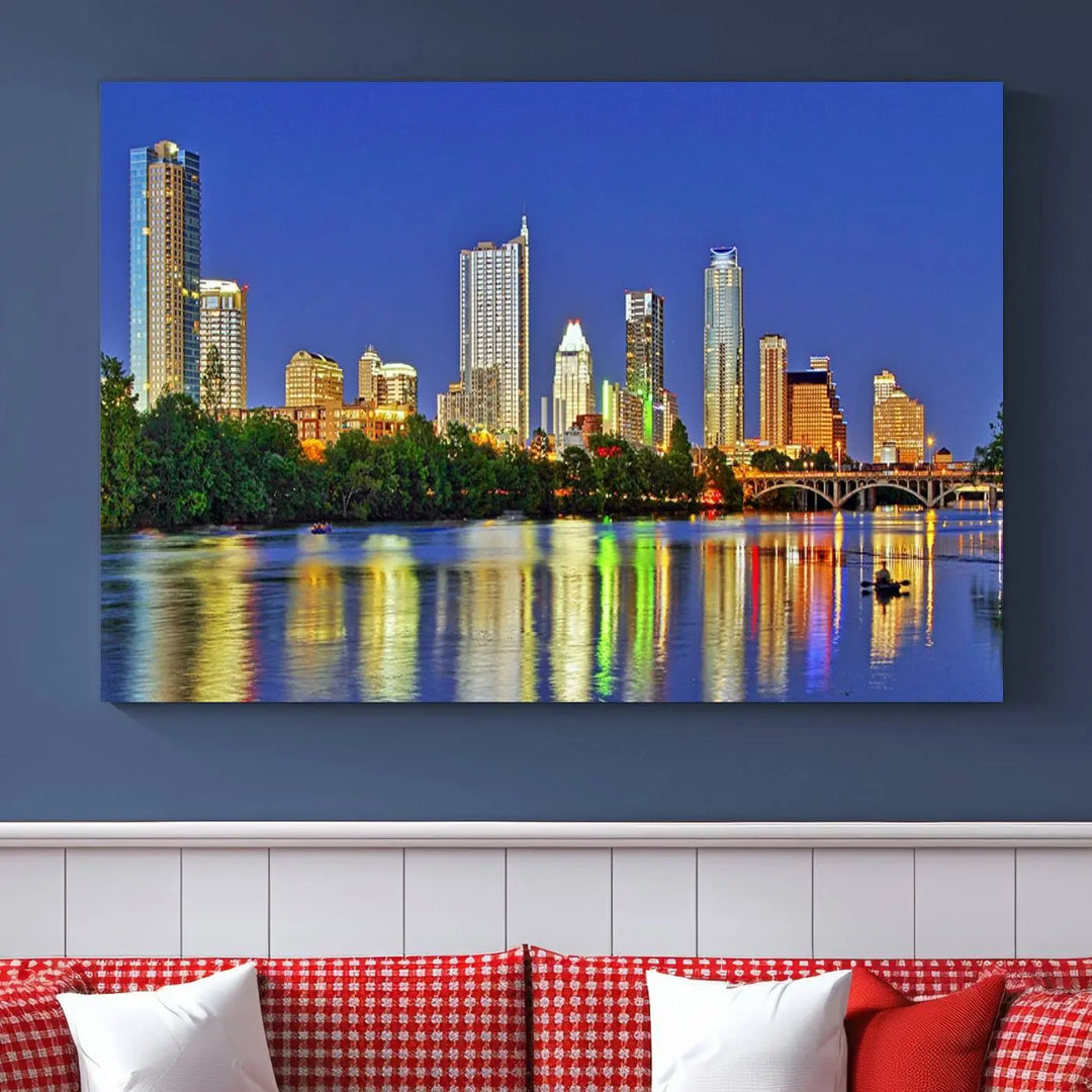 Austin City Lights Skyline Cityscape View Wall Art Canvas Print showcases a stunning triptych of a city skyline at night, featuring the reflection of illuminated buildings on a river. Made with museum-quality polycotton and finished with a UV-protective coating, it is ready to hang and instantly elevate your space.