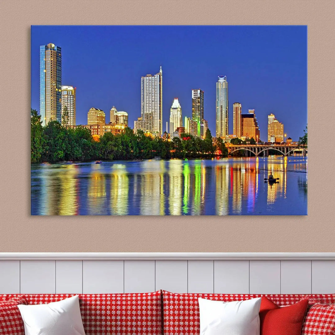 Austin City Lights Skyline Cityscape View Wall Art Canvas Print showcases a stunning triptych of a city skyline at night, featuring the reflection of illuminated buildings on a river. Made with museum-quality polycotton and finished with a UV-protective coating, it is ready to hang and instantly elevate your space.