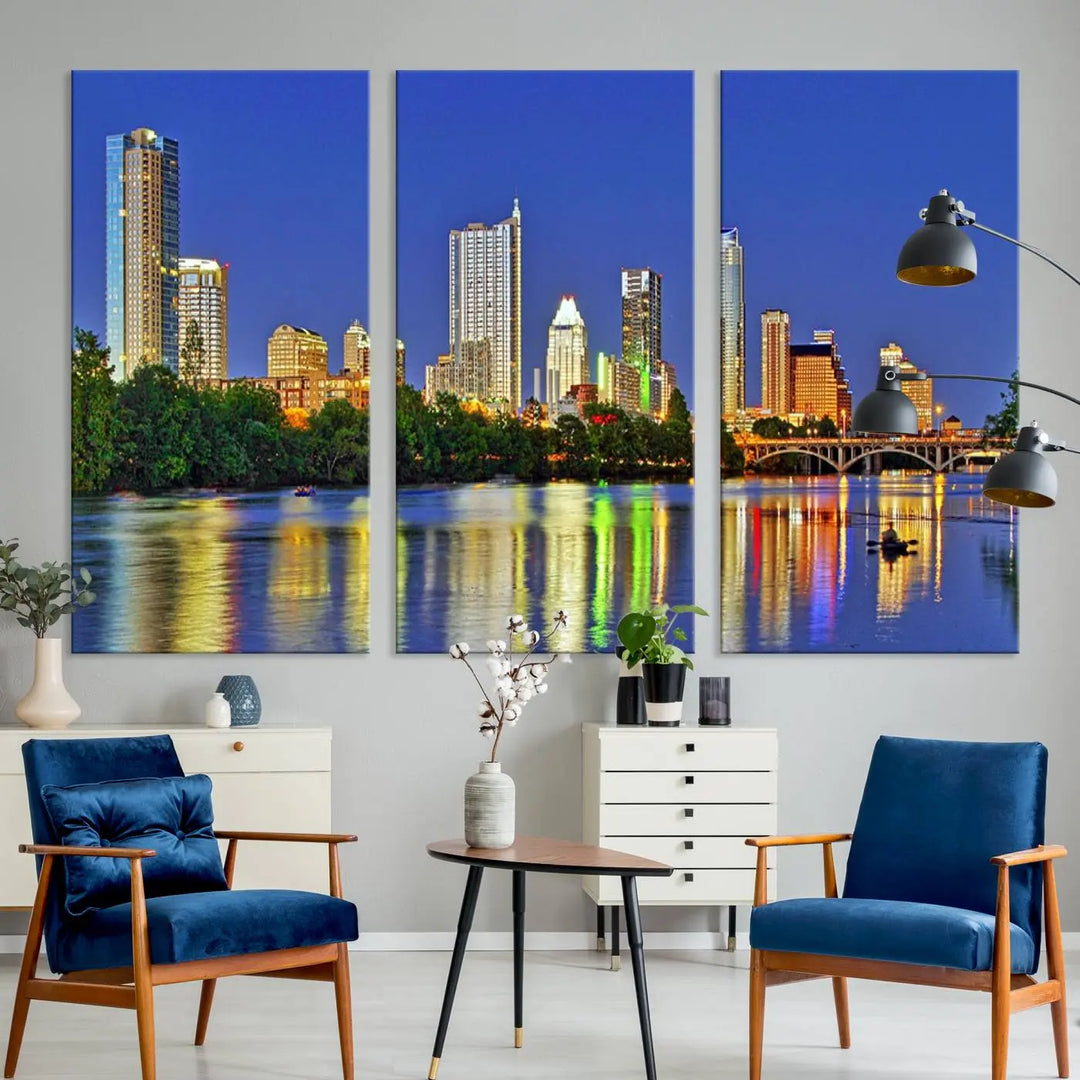 Austin City Lights Skyline Cityscape View Wall Art Canvas Print showcases a stunning triptych of a city skyline at night, featuring the reflection of illuminated buildings on a river. Made with museum-quality polycotton and finished with a UV-protective coating, it is ready to hang and instantly elevate your space.