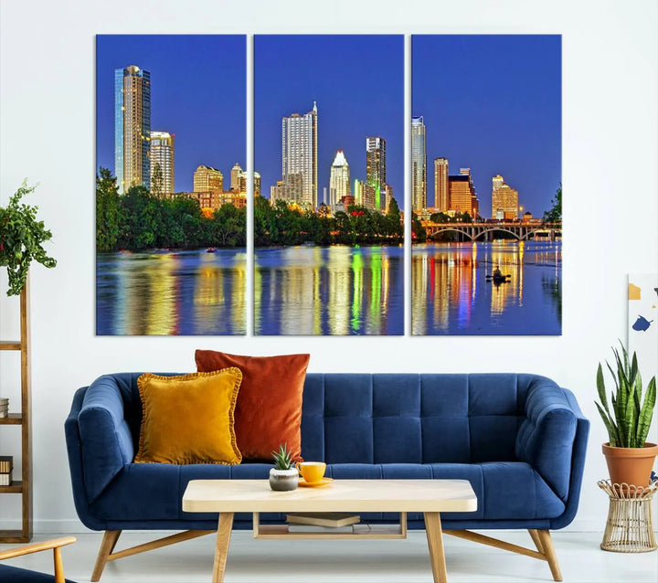 Austin City Lights Skyline Cityscape View Wall Art Canvas Print showcases a stunning triptych of a city skyline at night, featuring the reflection of illuminated buildings on a river. Made with museum-quality polycotton and finished with a UV-protective coating, it is ready to hang and instantly elevate your space.