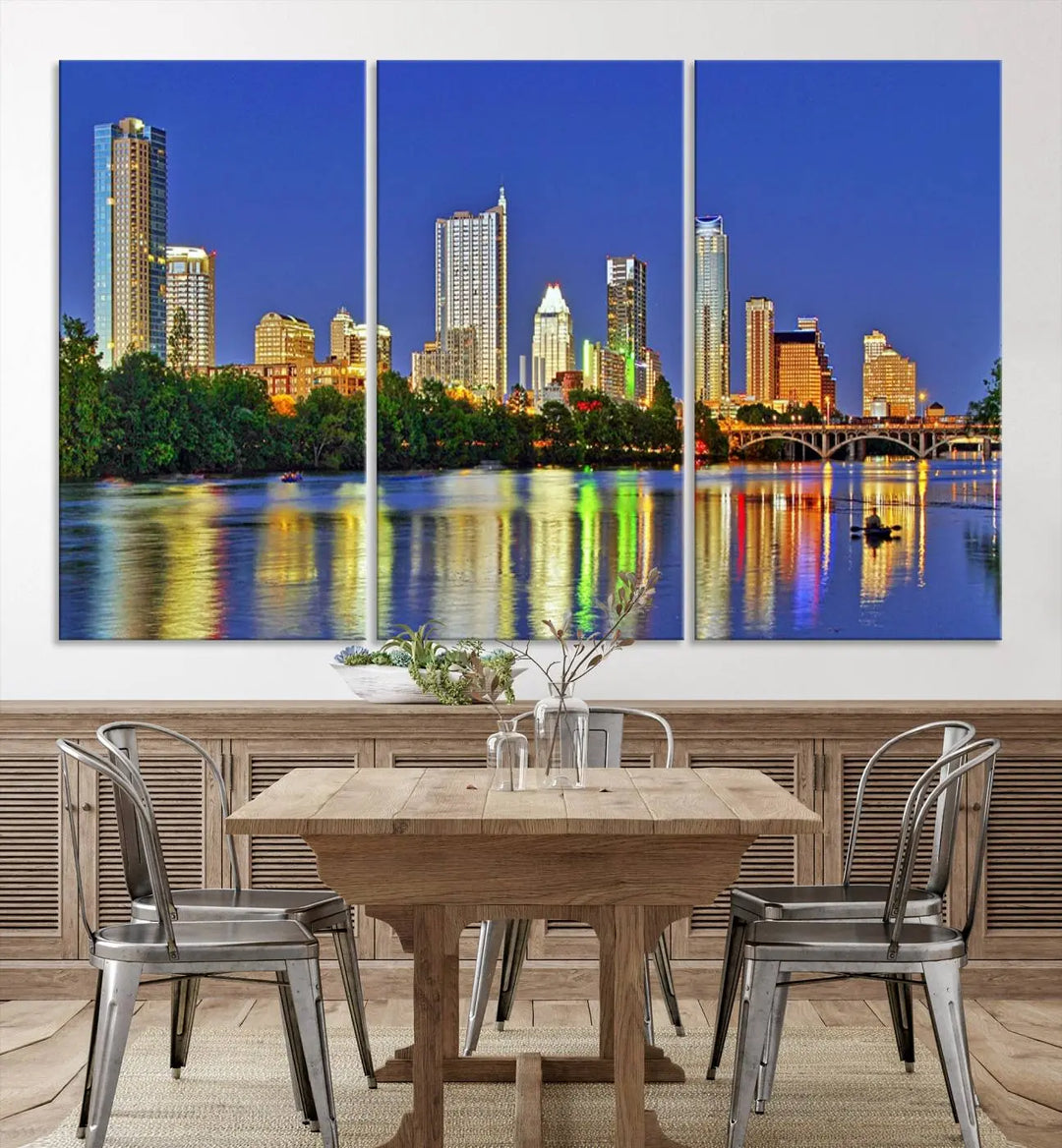 Austin City Lights Skyline Cityscape View Wall Art Canvas Print showcases a stunning triptych of a city skyline at night, featuring the reflection of illuminated buildings on a river. Made with museum-quality polycotton and finished with a UV-protective coating, it is ready to hang and instantly elevate your space.