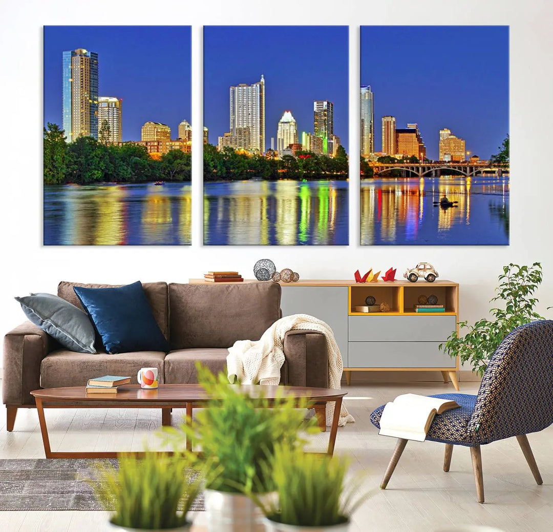 Austin City Lights Skyline Cityscape View Wall Art Canvas Print showcases a stunning triptych of a city skyline at night, featuring the reflection of illuminated buildings on a river. Made with museum-quality polycotton and finished with a UV-protective coating, it is ready to hang and instantly elevate your space.