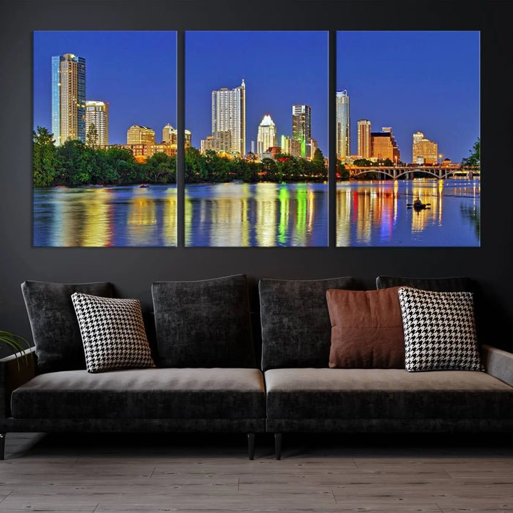 Austin City Lights Skyline Cityscape View Wall Art Canvas Print showcases a stunning triptych of a city skyline at night, featuring the reflection of illuminated buildings on a river. Made with museum-quality polycotton and finished with a UV-protective coating, it is ready to hang and instantly elevate your space.