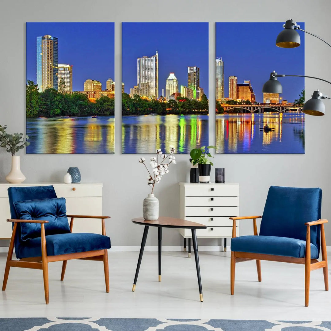 Austin City Lights Skyline Cityscape View Wall Art Canvas Print showcases a stunning triptych of a city skyline at night, featuring the reflection of illuminated buildings on a river. Made with museum-quality polycotton and finished with a UV-protective coating, it is ready to hang and instantly elevate your space.