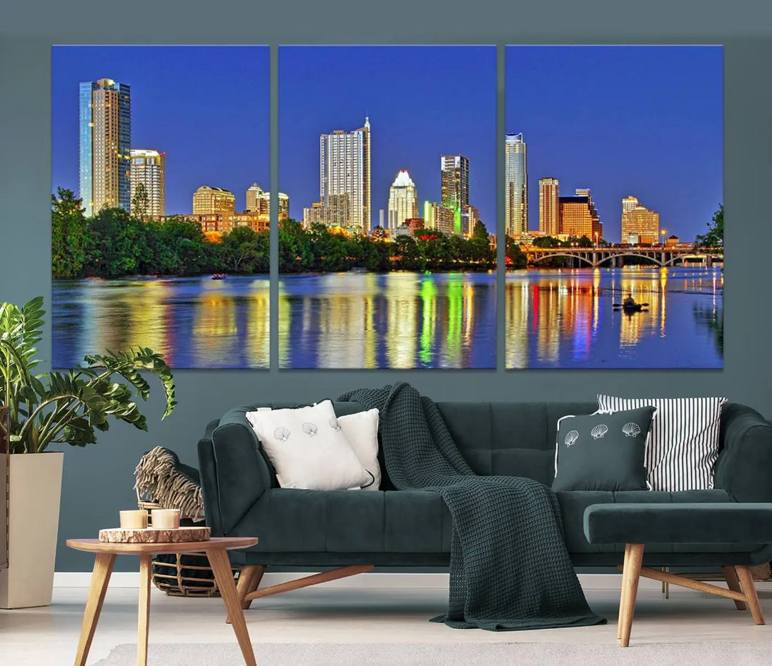 Austin City Lights Skyline Cityscape View Wall Art Canvas Print showcases a stunning triptych of a city skyline at night, featuring the reflection of illuminated buildings on a river. Made with museum-quality polycotton and finished with a UV-protective coating, it is ready to hang and instantly elevate your space.