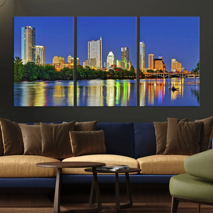 Austin City Lights Skyline Cityscape View Wall Art Canvas Print showcases a stunning triptych of a city skyline at night, featuring the reflection of illuminated buildings on a river. Made with museum-quality polycotton and finished with a UV-protective coating, it is ready to hang and instantly elevate your space.