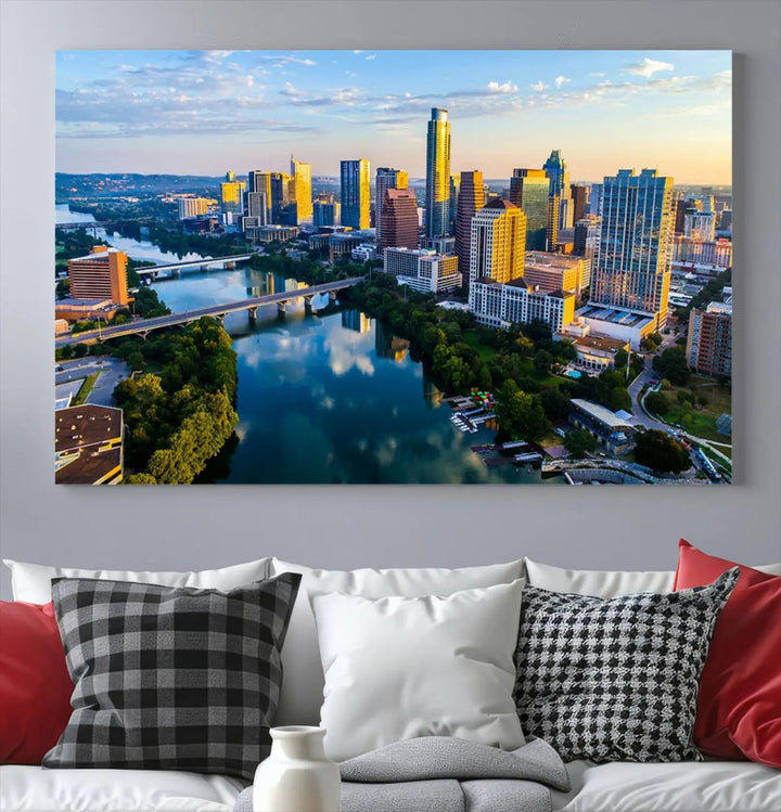 The Austin City Morning Sunrise Skyline Cityscape View Wall Art Canvas Print features a stunning view of a modern city skyline at sunrise, reflecting in a tranquil river. It is crafted on museum-quality canvas with UV-protective coating to ensure its lasting beauty.