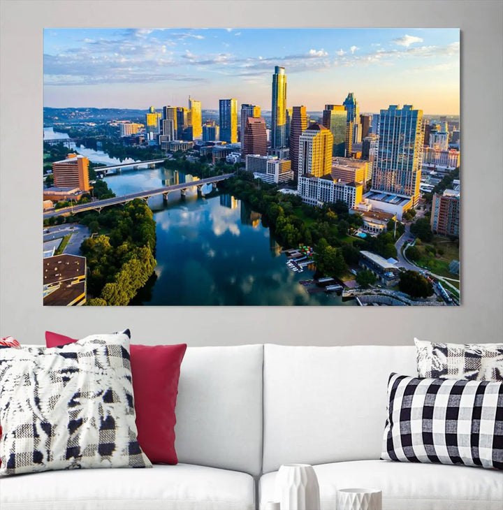 The Austin City Morning Sunrise Skyline Cityscape View Wall Art Canvas Print features a stunning view of a modern city skyline at sunrise, reflecting in a tranquil river. It is crafted on museum-quality canvas with UV-protective coating to ensure its lasting beauty.