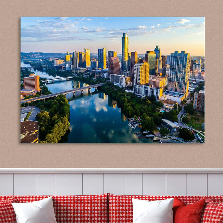 The Austin City Morning Sunrise Skyline Cityscape View Wall Art Canvas Print features a stunning view of a modern city skyline at sunrise, reflecting in a tranquil river. It is crafted on museum-quality canvas with UV-protective coating to ensure its lasting beauty.