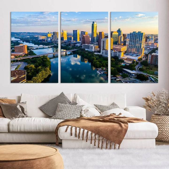 The Austin City Morning Sunrise Skyline Cityscape View Wall Art Canvas Print features a stunning view of a modern city skyline at sunrise, reflecting in a tranquil river. It is crafted on museum-quality canvas with UV-protective coating to ensure its lasting beauty.