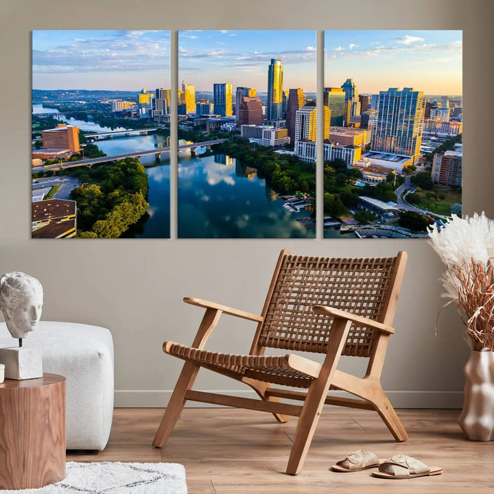 The Austin City Morning Sunrise Skyline Cityscape View Wall Art Canvas Print features a stunning view of a modern city skyline at sunrise, reflecting in a tranquil river. It is crafted on museum-quality canvas with UV-protective coating to ensure its lasting beauty.