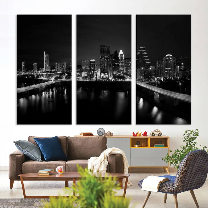 The Austin City Skyline Black and White Wall Art Cityscape Canvas Print, a stunning triptych of a nighttime cityscape printed on museum-quality canvases, adorns the wall. This hand-assembled framed artwork exudes elegance and features a UV-protective coating to maintain the city's captivating allure.