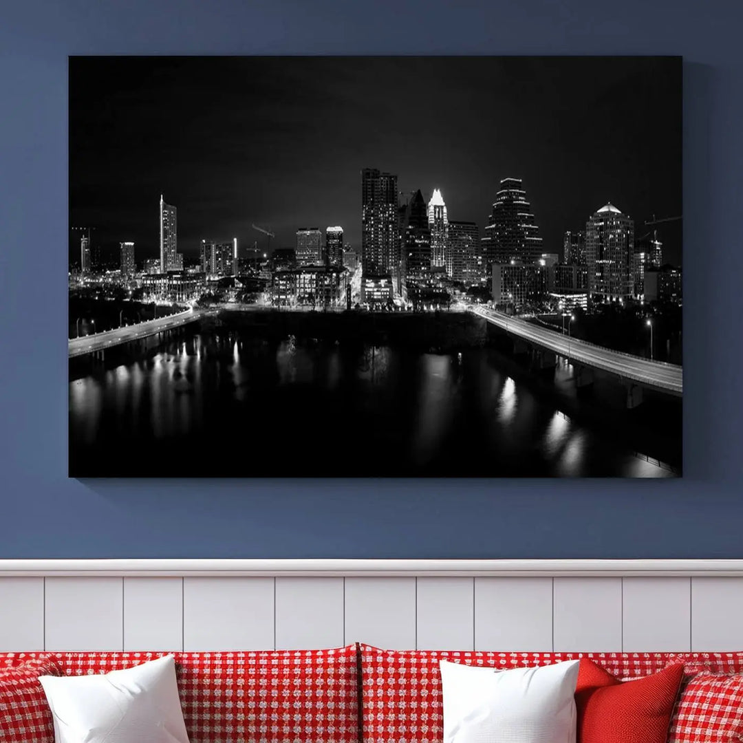 The Austin City Skyline Black and White Wall Art Cityscape Canvas Print, a stunning triptych of a nighttime cityscape printed on museum-quality canvases, adorns the wall. This hand-assembled framed artwork exudes elegance and features a UV-protective coating to maintain the city's captivating allure.