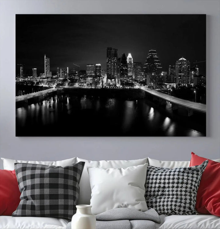 The Austin City Skyline Black and White Wall Art Cityscape Canvas Print, a stunning triptych of a nighttime cityscape printed on museum-quality canvases, adorns the wall. This hand-assembled framed artwork exudes elegance and features a UV-protective coating to maintain the city's captivating allure.