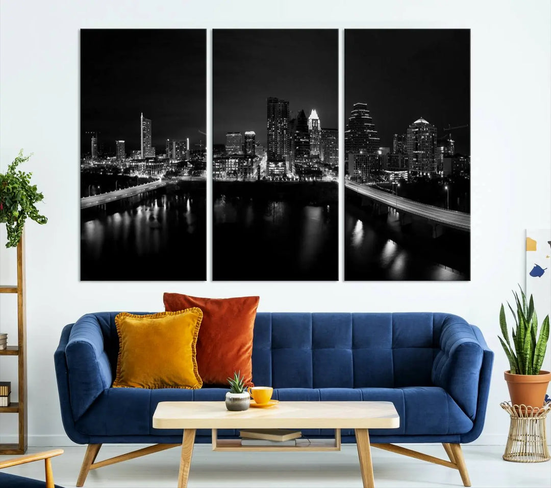 The Austin City Skyline Black and White Wall Art Cityscape Canvas Print, a stunning triptych of a nighttime cityscape printed on museum-quality canvases, adorns the wall. This hand-assembled framed artwork exudes elegance and features a UV-protective coating to maintain the city's captivating allure.